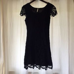Crocheted black dress.  Fully lined.  Size small.